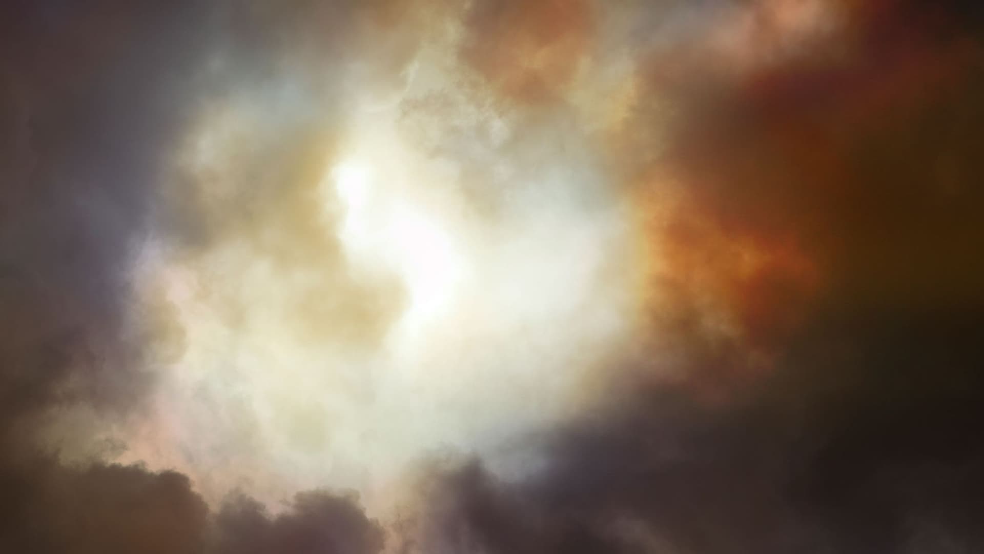 Das Bild zeigt eine dramatische Wolkenformation in verschiedenen Farben, von hellen Gelb- und Weißtönen bis hin zu dunklem Grau und Schwarz. Im Zentrum bricht ein intensives Licht durch die Wolkendecke, was eine bedrohliche Stimmung erzeugt.