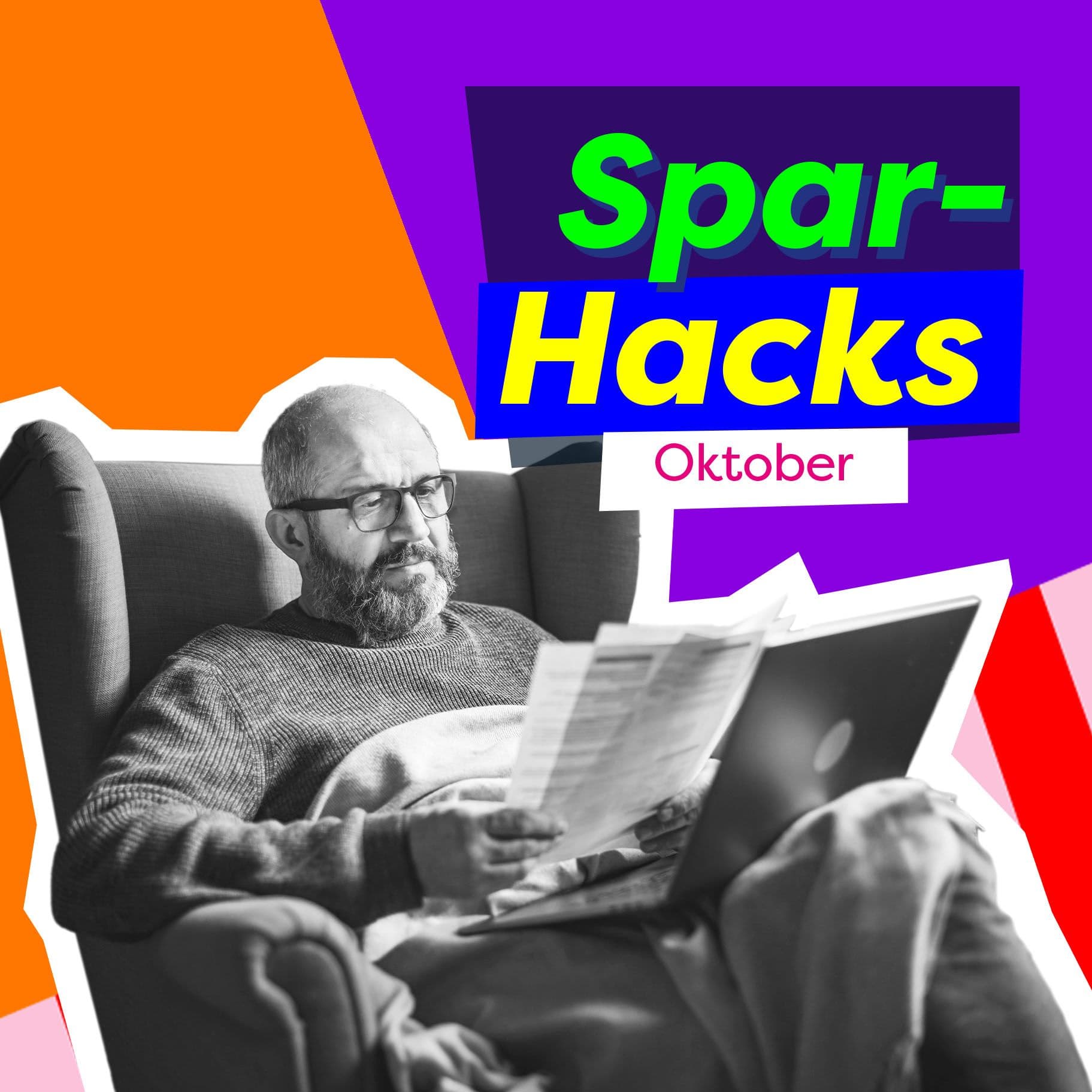 Ein älterer Mann mit grauem Vollbart und Lesebrille sitzt in einem Sessel mit dem Laptop auf dem Schoß und schaut auf mehrere Papierdokumente. 